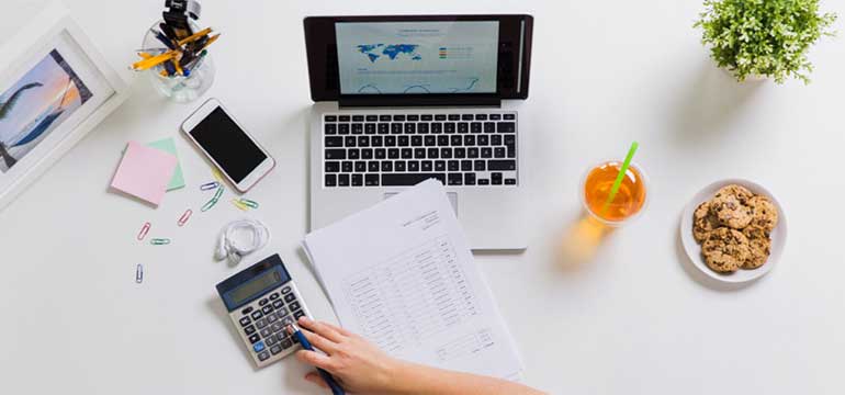 /getmedia/597bebc9-b8d4-4b34-bbae-c9c12d0c7284/stock-photo-business-accounting-and-freelance-concept-woman-with-calculator-papers-and-laptop-computer-mob.jpg.aspx